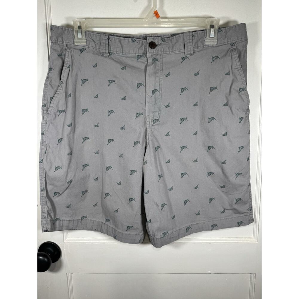Magellan Outdoors men's chino shorts feature a distinctive swordfish